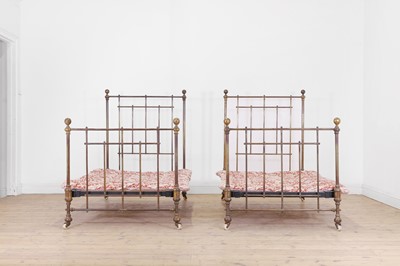 Lot 113 - A pair of Victorian brass single beds