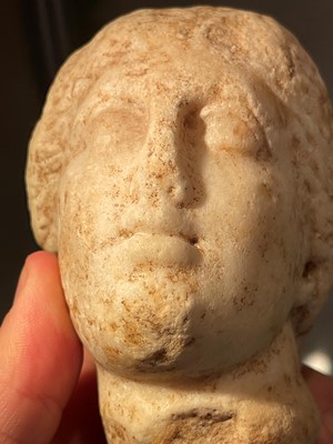 Lot 278 - A Greek Hellenistic marble head of Aphrodite