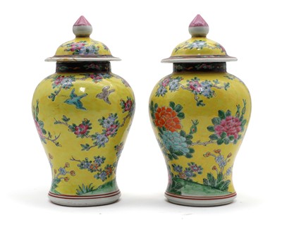 Lot 300A - A pair of Chinese porcelain vases and covers