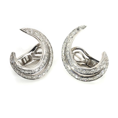 Lot 121 - A pair of white gold diamond earrings