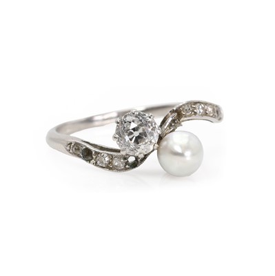 Lot 61 - A platinum cultured pearl and diamond ring