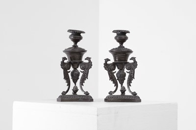 Lot 368 - A pair of grand tour bronze candlesticks