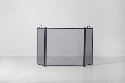 Lot 479 - A patinated metal and wirework spark guard