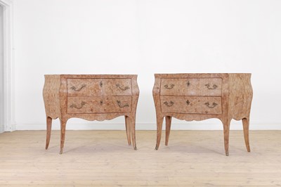 Lot 573 - A pair of Louis XV-style walnut parquetry commodes