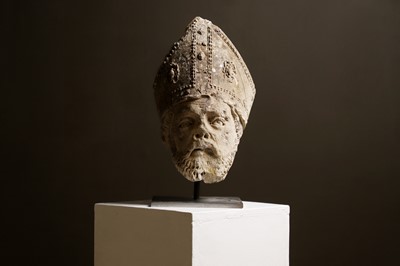 Lot 180 - A carved stone head of a bishop