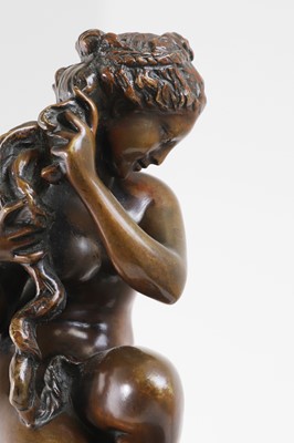 Lot 357 - A bronze model of the Crouching Venus