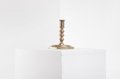 Lot 372 - A brass candlestick