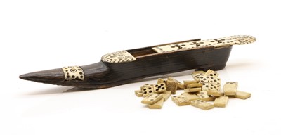 Lot 322 - A treen and bone domino shoe