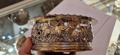 Lot 97 - A pair of silver wine coasters