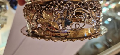 Lot 97 - A pair of silver wine coasters