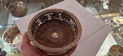 Lot 97 - A pair of silver wine coasters