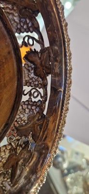 Lot 97 - A pair of silver wine coasters