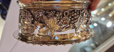 Lot 97 - A pair of silver wine coasters