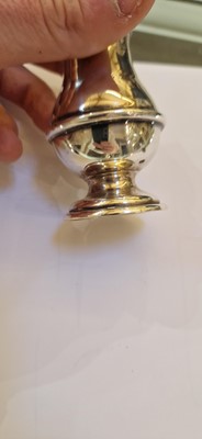 Lot 97 - A pair of silver wine coasters
