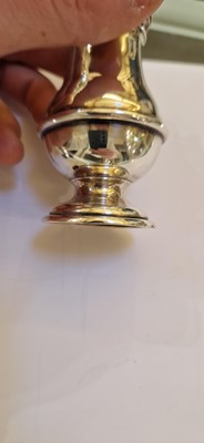 Lot 97 - A pair of silver wine coasters