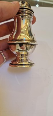 Lot 97 - A pair of silver wine coasters