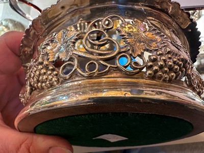 Lot 97 - A pair of silver wine coasters