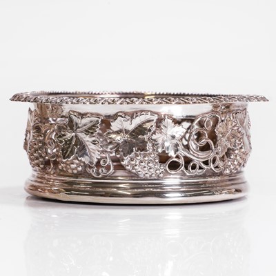 Lot 97 - A pair of silver wine coasters
