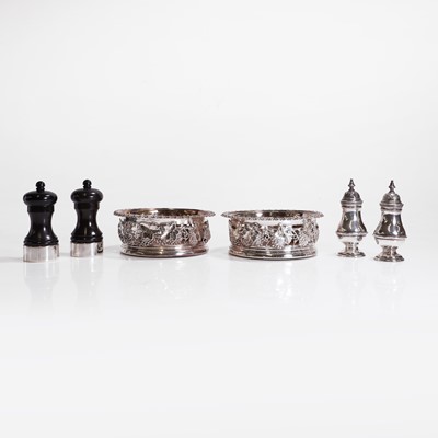 Lot 97 - A pair of silver wine coasters