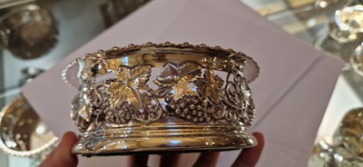 Lot 97 - A pair of silver wine coasters