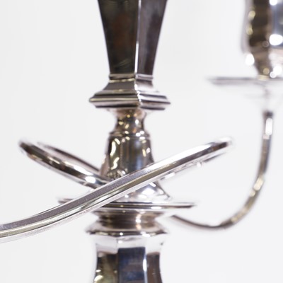 Lot 94 - A pair of silver three-branch candelabra