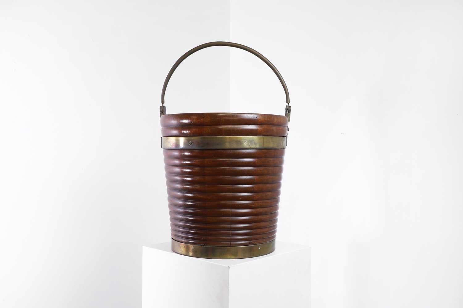 Lot 22 - A George III mahogany plate bucket