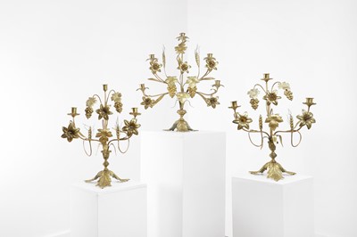 Lot 138 - Three gilt-metal candelabra