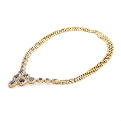 Lot 214 - An 18ct gold sapphire and diamond bib necklace