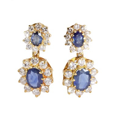 Lot 213 - A pair of sapphire and diamond cluster drop earrings