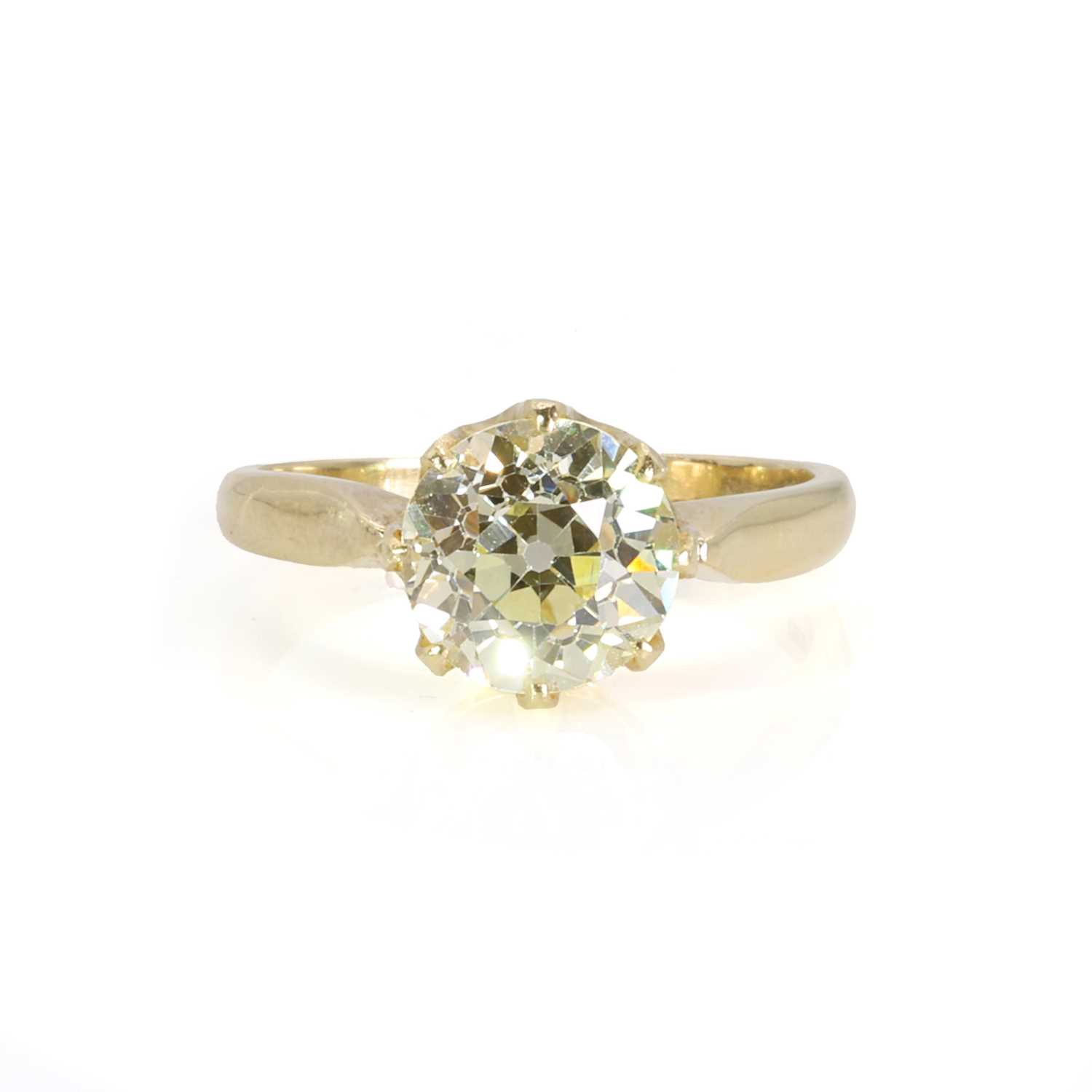 Coloured Solitaire Rings Lot 197 - An 18ct gold fancy coloured diamond