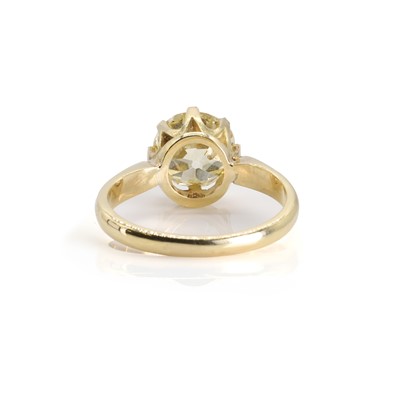 Lot 197 - An 18ct gold fancy coloured diamond solitaire ring