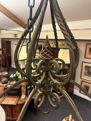 Lot 153 - A wrought-iron six-branch chandelier