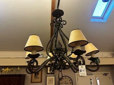 Lot 153 - A wrought-iron six-branch chandelier