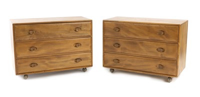 Lot 677 - A pair of Ercol 'Windsor' chest of drawers