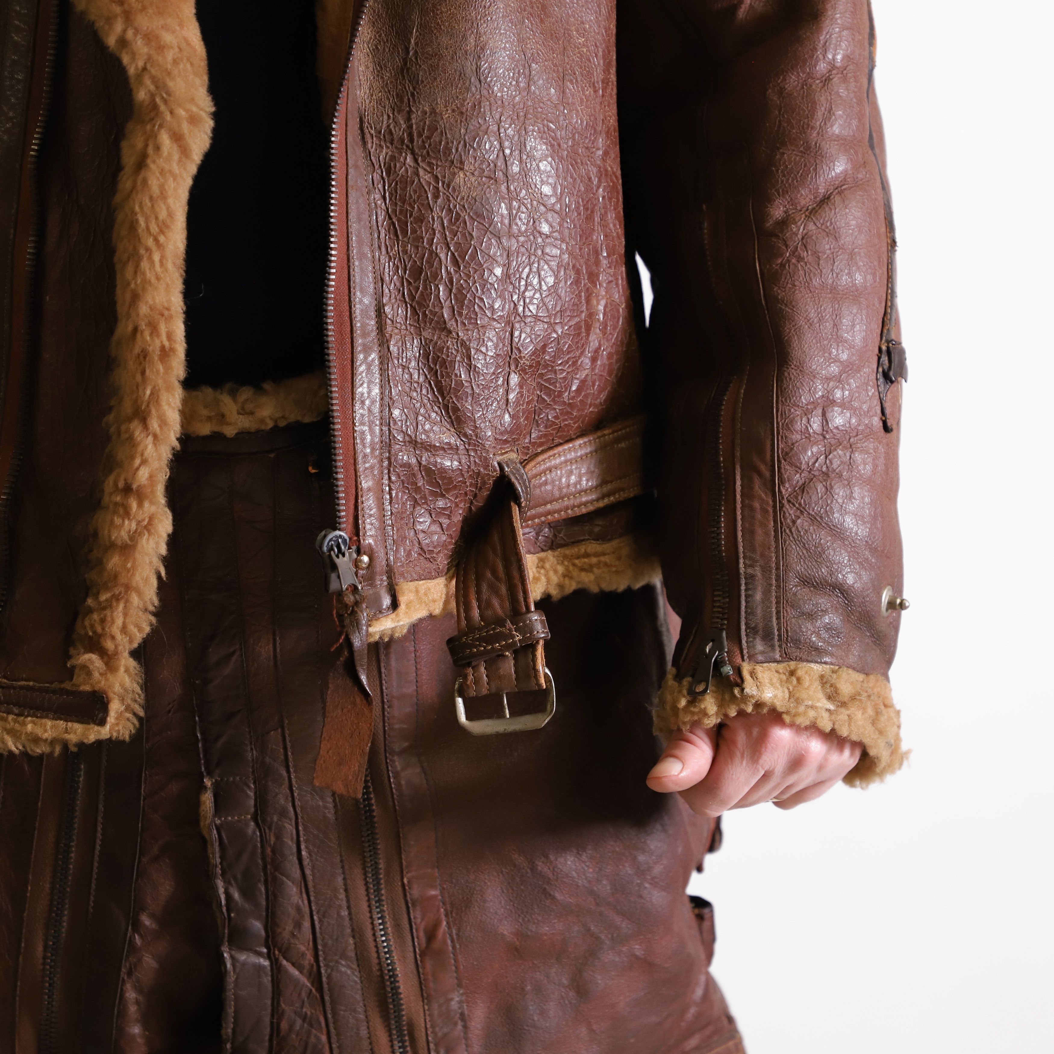 Lot 423 - A sheepskin flying jacket and trousers,