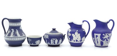 Lot 99 - Three Wedgwood blue Jasperware jugs