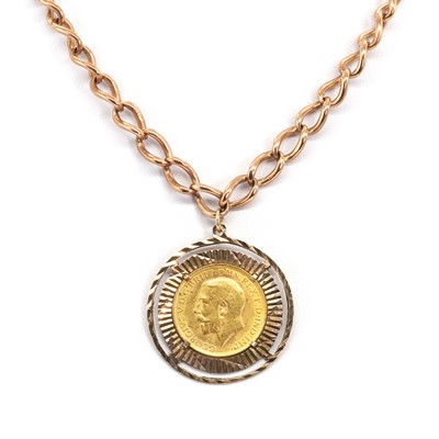 Lot 1435 - A sovereign coin pendant and an Albert chain