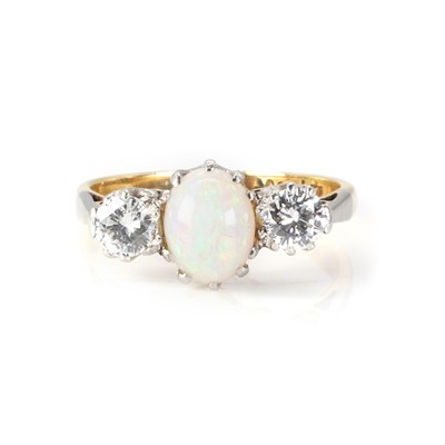 Lot 1230 - An opal and diamond three stone ring