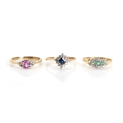 Lot 1324 - A group of three 9ct gold gem set rings