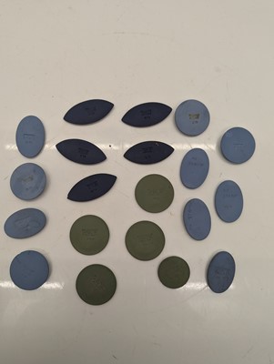 Lot 115 - A collection of plaster plaques