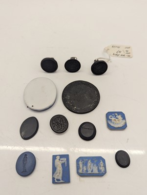 Lot 115 - A collection of plaster plaques