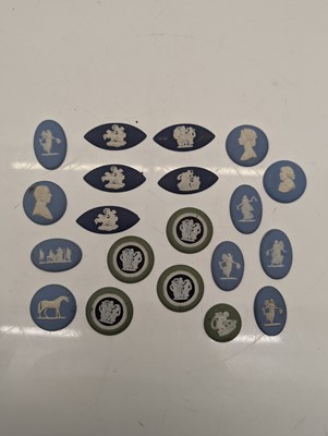 Lot 115 - A collection of plaster plaques