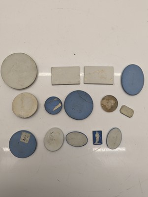 Lot 115 - A collection of plaster plaques