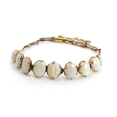 Lot 1042 - An Edwardian graduated opal bracelet