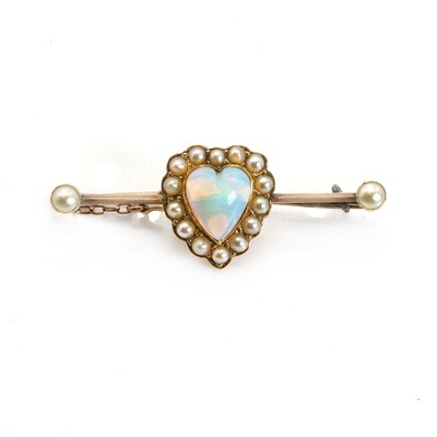 Lot 1046 - An Edwardian opal and split pearl brooch