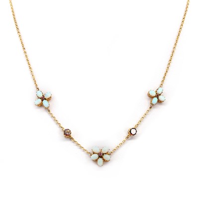 Lot 1047 - An Edwardian opal and garnet necklace