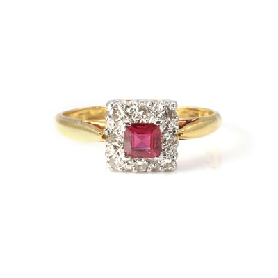 Lot 1174 - A ruby and diamond ring