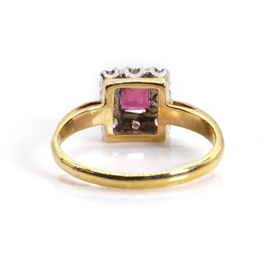 Lot 1174 - A ruby and diamond ring