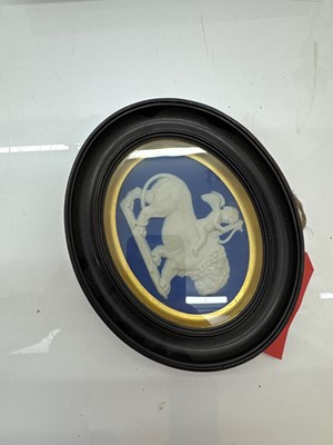 Lot 109 - A group of seven framed Wedgwood Jasperware plaques
