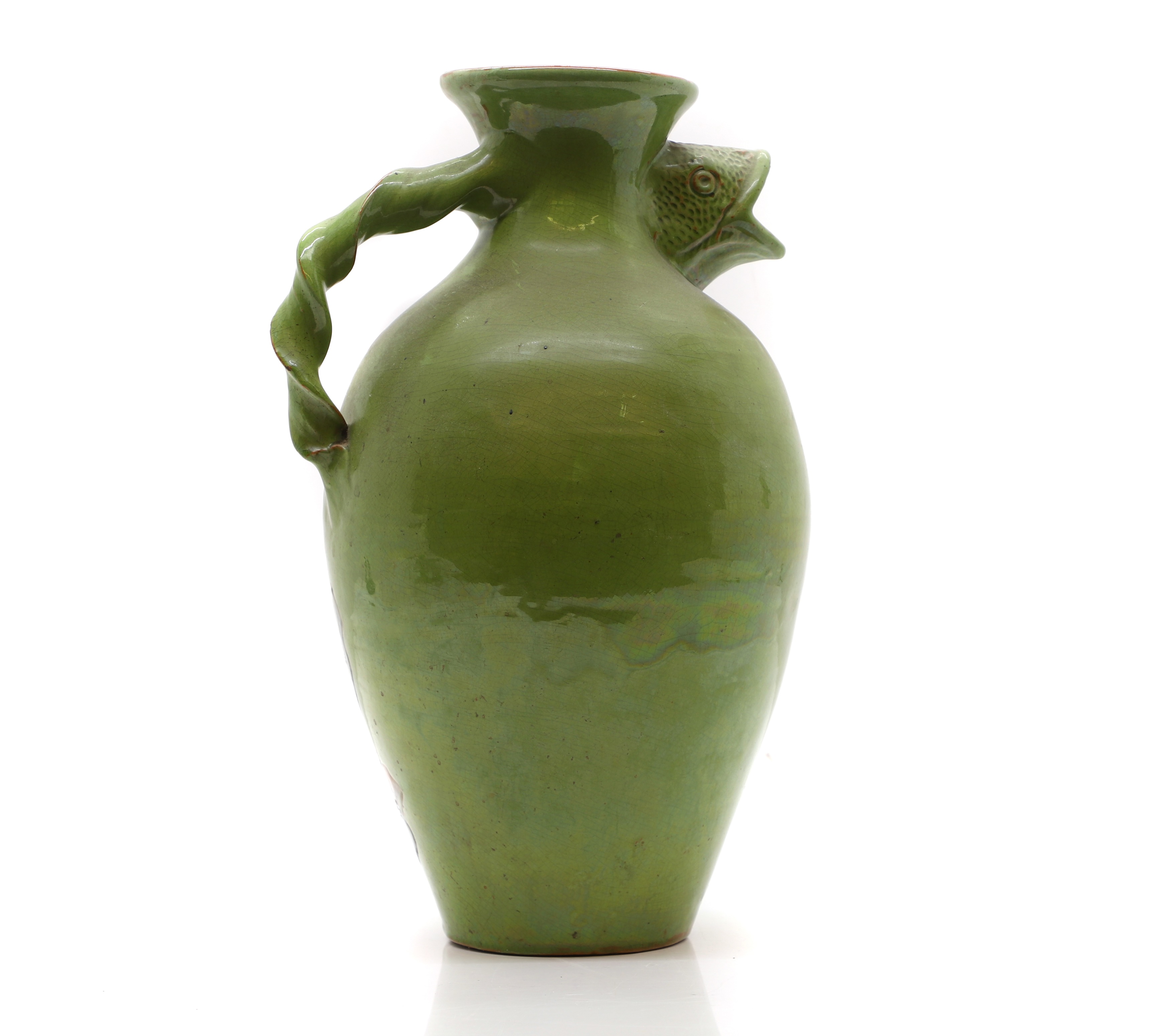 Lot 307 - A CH Brannam glazed pottery ewer,